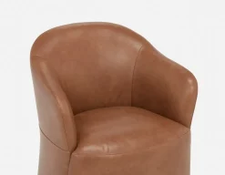 MAGNUS leatherette dining chair on casters